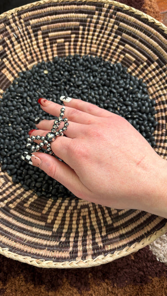 STERLING SILVER PEARL BOW STRETCH RING