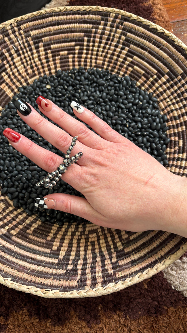 STERLING SILVER PEARL BOW STRETCH RING